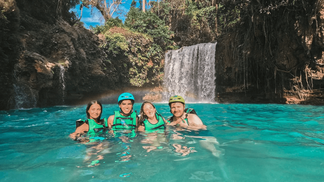 Travelers at a canyon in Moalboal, Philippines