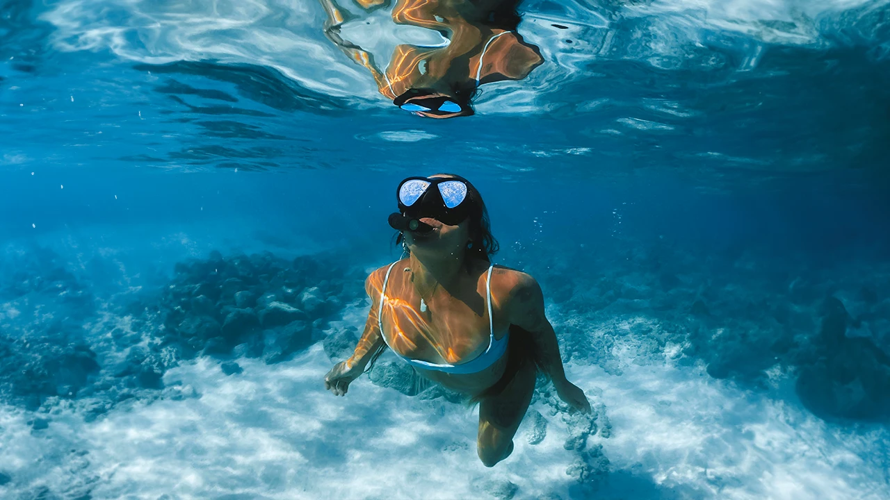 Divers on a boat ready to snorkel the Maldives reefs